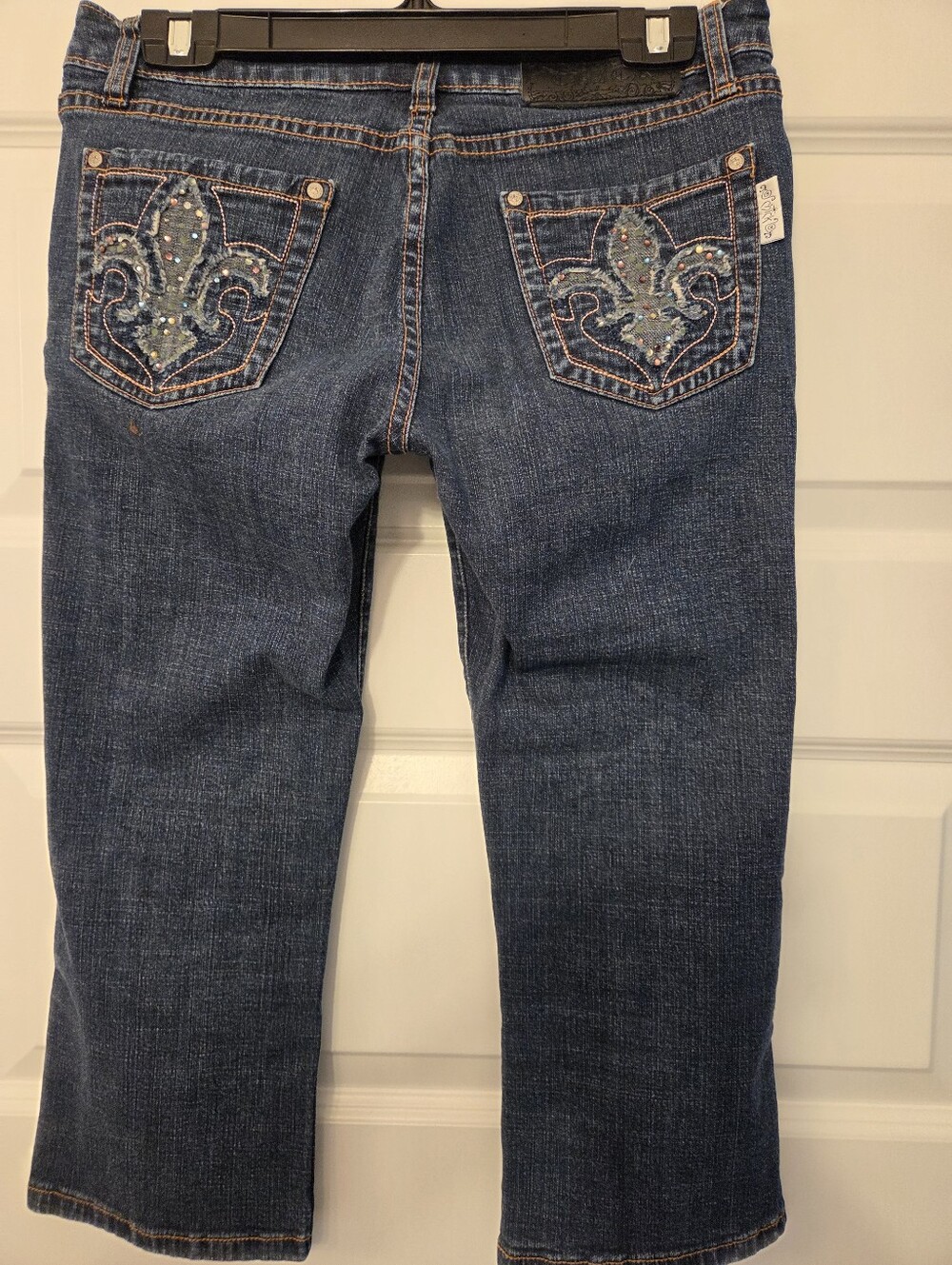 Natasha Couture Dark Blue Capri Jeans with Rhinestone Fleur-de-Lis Pockets